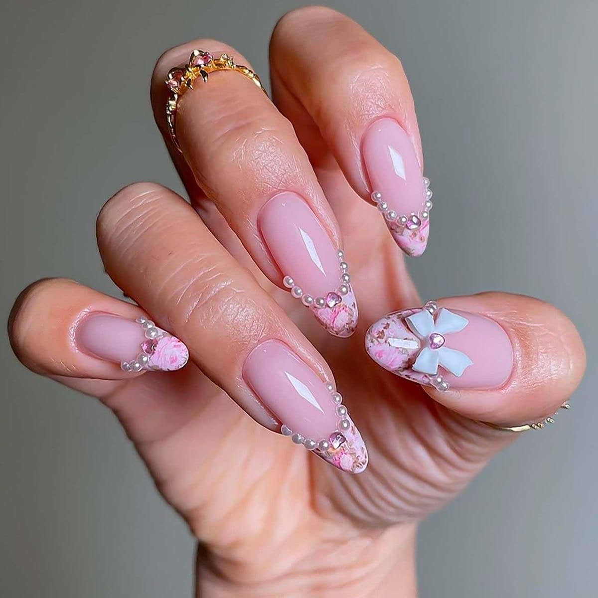 Pink floral manicure with pearl details