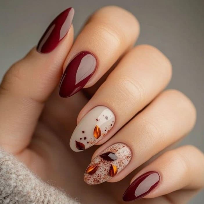 Wine and cream manicure design